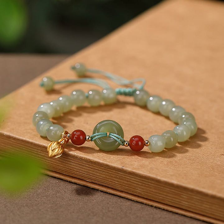 Braccialetto della fortuna in agata rossa con fibbia della pace in giada naturale Hetian in argento sterling 925 Buddha Stones
