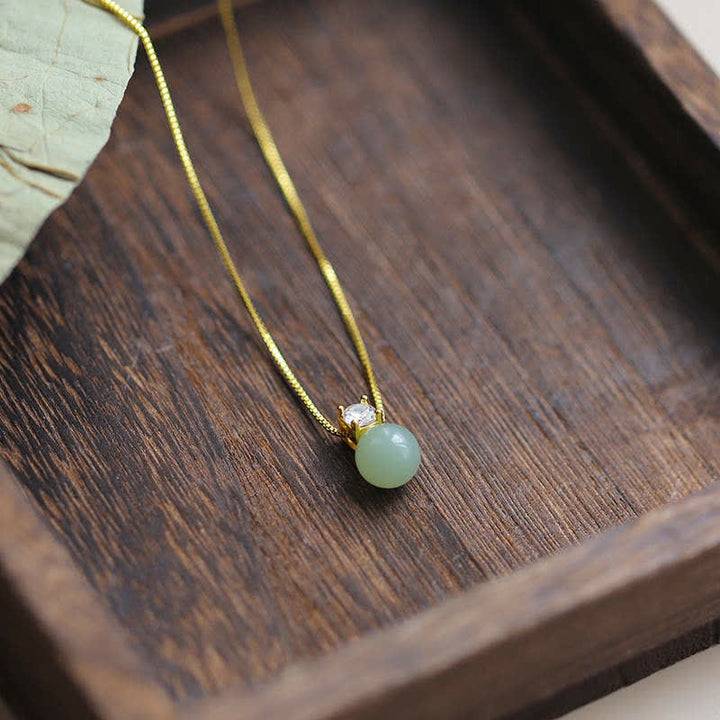 Collana con ciondolo a catena con perline portafortuna in giada Buddha Stones