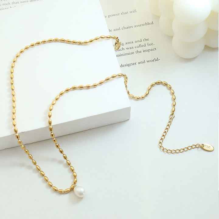 Collana con ciondolo di perle e perle della pace