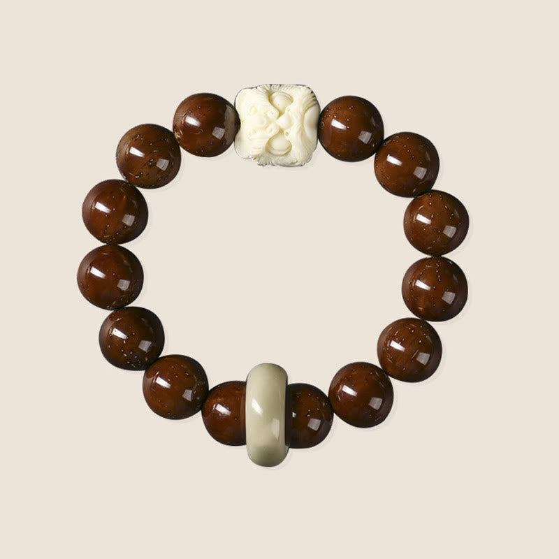 Braccialetto della saggezza del leone danzante dei semi di Bodhi viola Buddha Stones