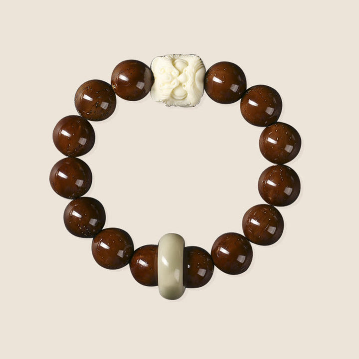 Braccialetto della saggezza del leone danzante dei semi di Bodhi viola Buddha Stones