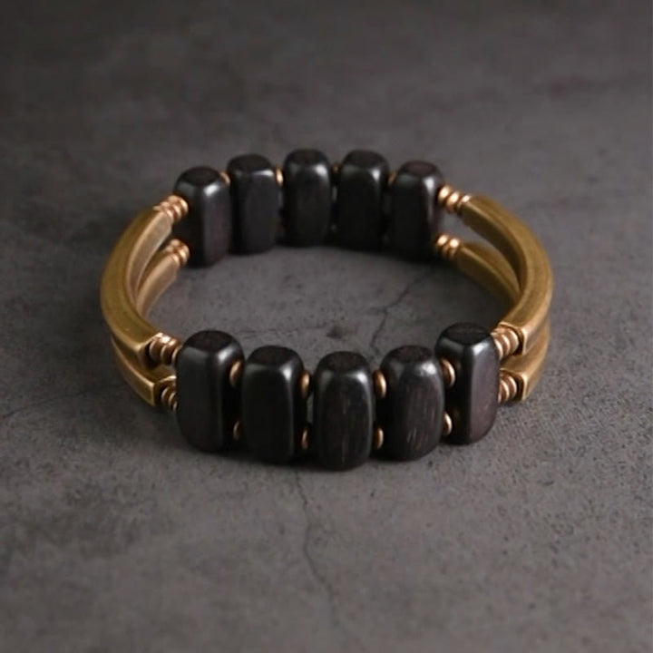 Braccialetto a doppio strato in ebano tibetano con Buddha Stones e rame