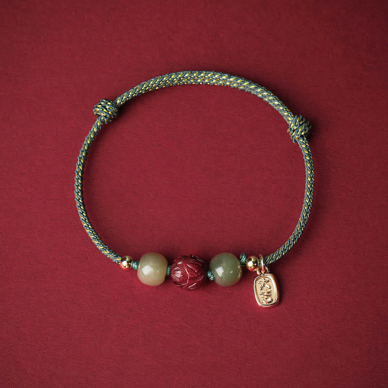 Braccialetto di corda artigianale Buddha Stones in giada Hetian placcato oro 14K, cinabro e loto portafortuna