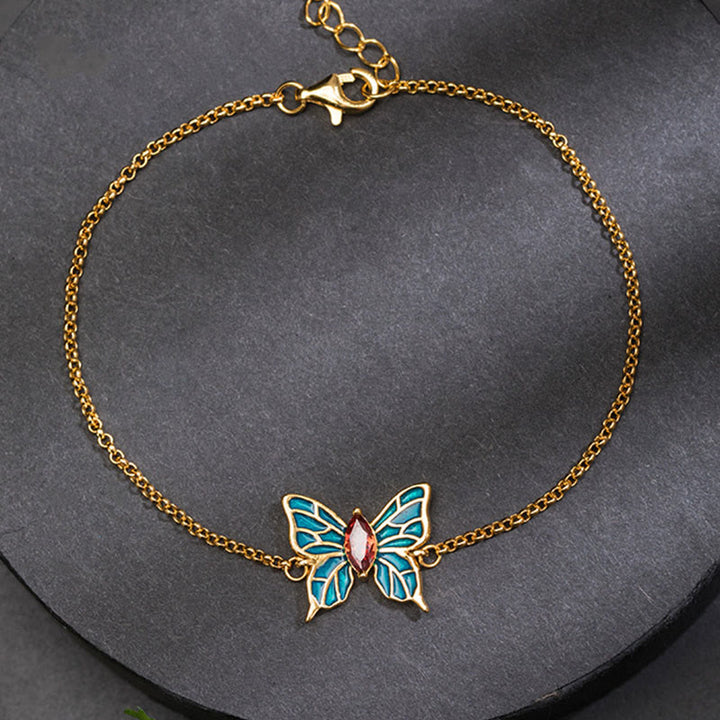 Bracciale Buddha Stones in argento sterling 925 con catena a farfalla e zirconi - image 1