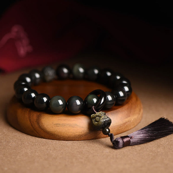Buddha Stones Ossidiana nera naturale Leone Mala da polso Protezione Nappe Mala tascabile Decorazione per auto