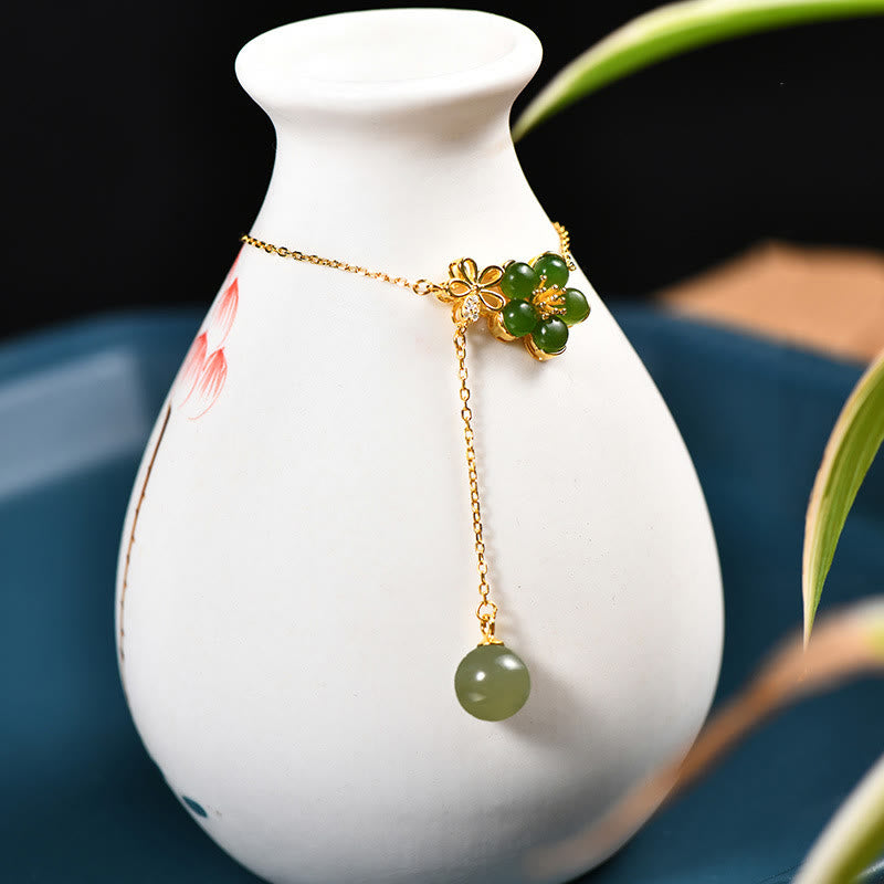 Collana con ciondolo portafortuna in argento sterling 925 con fiore di prugna in giada ciano Hetian, motivo Buddha Stones