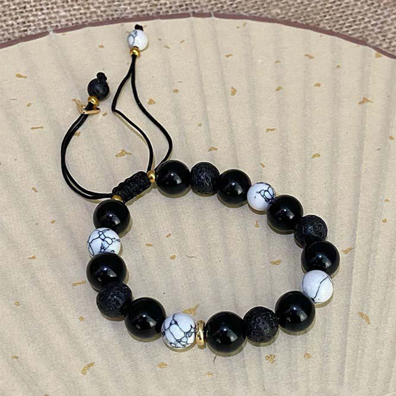Braccialetto di forza Yin Yang in pietra lavica di ossidiana nera Buddha Stones