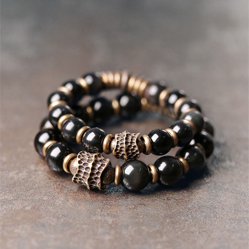 Braccialetto di guarigione dell'amore in rame e ossidiana arcobaleno Buddha Stones