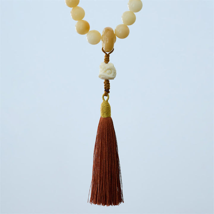 Buddha Stones Semi di Bodhi naturali Avorio Frutta Leone danzante Ciondolo Armonia Nappa Polso Mala