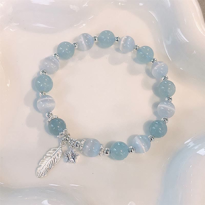 Bracciale con ciondolo a forma di stella di piuma con occhio di gatto e acquamarina in argento sterling 925 Buddha Stones