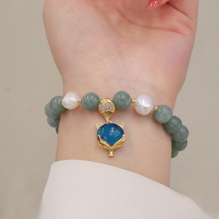 Braccialetto portafortuna con ciondolo volpe che cambia colore, perle di giada e Buddha Stones