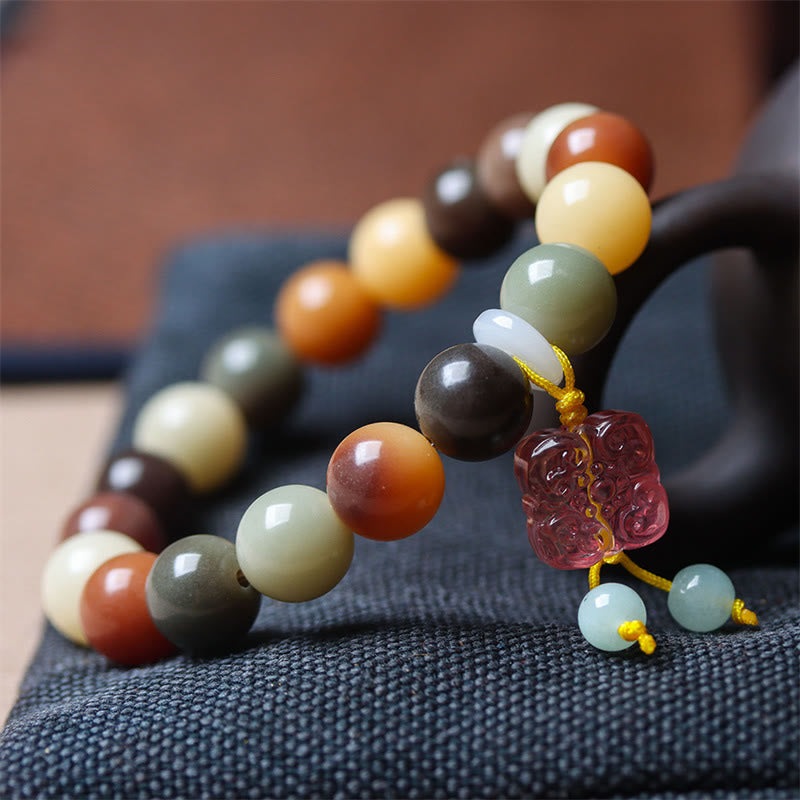Braccialetto della pace con ciondolo in vetro Liuli con semi di Bodhi multicolore sfumato naturale Buddha Stones