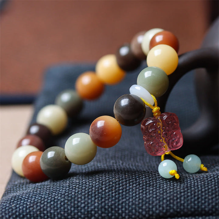 Braccialetto della pace con ciondolo in vetro Liuli con semi di Bodhi multicolore sfumato naturale Buddha Stones