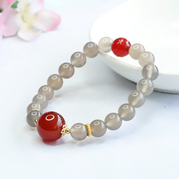 Braccialetto dell'armonia in agata rossa e calcedonio grigio naturale Buddha Stones