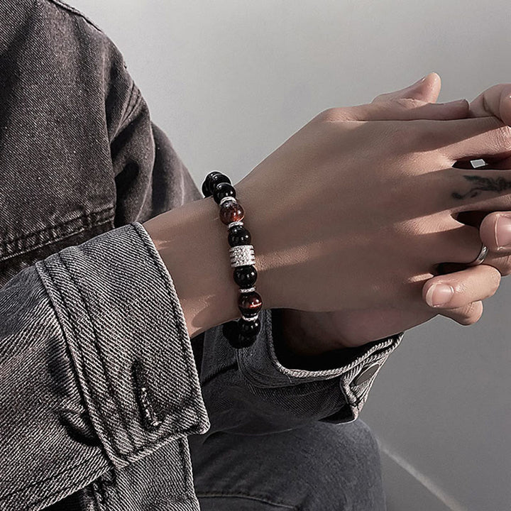 Bracciale Buddha Stones in ossidiana nera naturale con occhio di tigre e forza