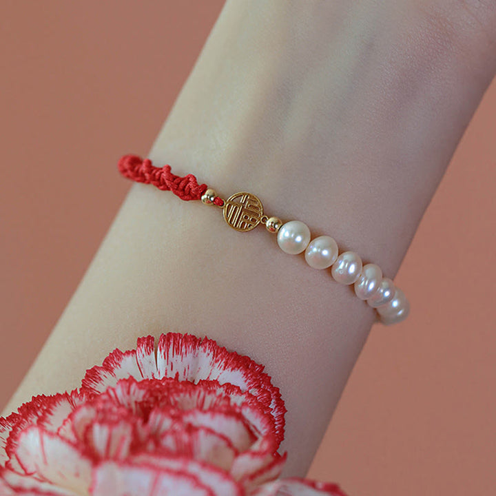 Braccialetto con treccia rossa e perle placcate in oro 14K e protezione dalla fortuna