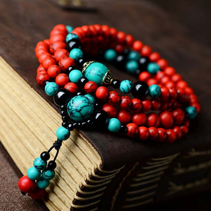 Braccialetto di protezione con perline di turchese rosso e onice nero Buddha Stones