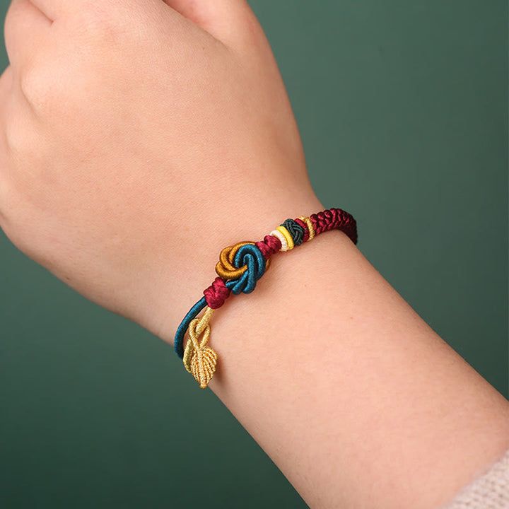 Braccialetto di corda della fortuna con nodo foglia mandala tibetano fatto a mano con Buddha Stones - image 1
