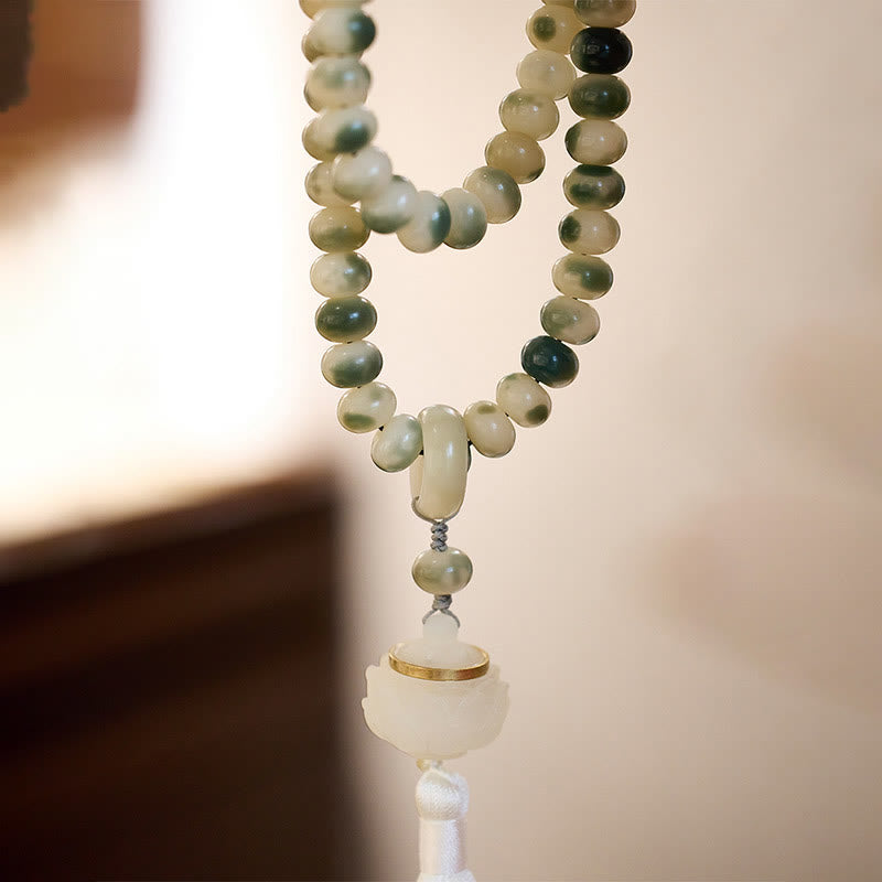 Buddha Stones naturali 108 perle Mala Bodhi Seed Lotus inciso braccialetto di saggezza nappa