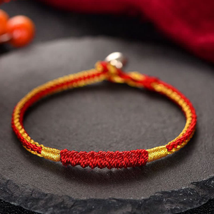 Braccialetto di protezione con corda portafortuna intrecciata fatta a mano in Buddha Stones tibetane