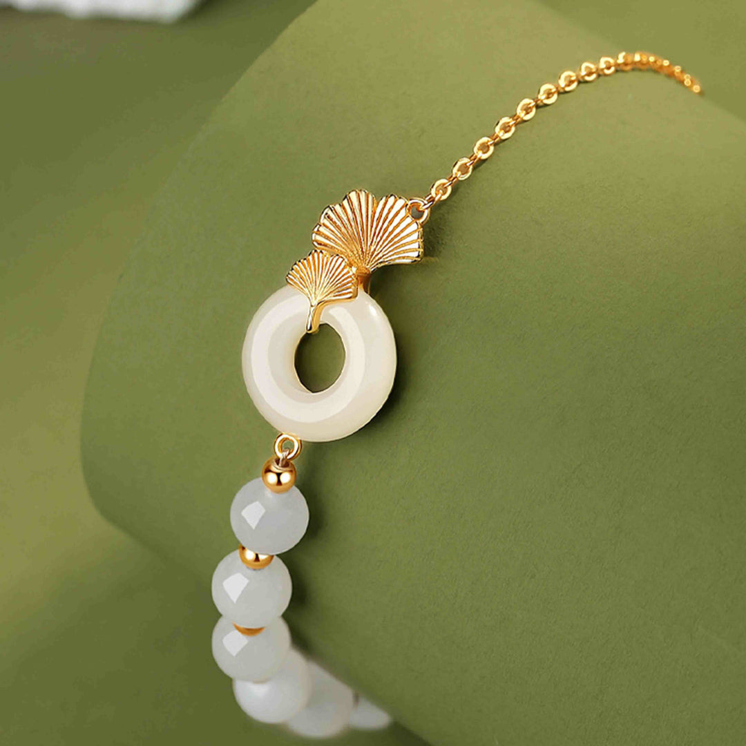 Braccialetto della fortuna con foglia di ginkgo e fibbia della pace in argento sterling 925 con Buddha Stones e giada bianca Hetian
