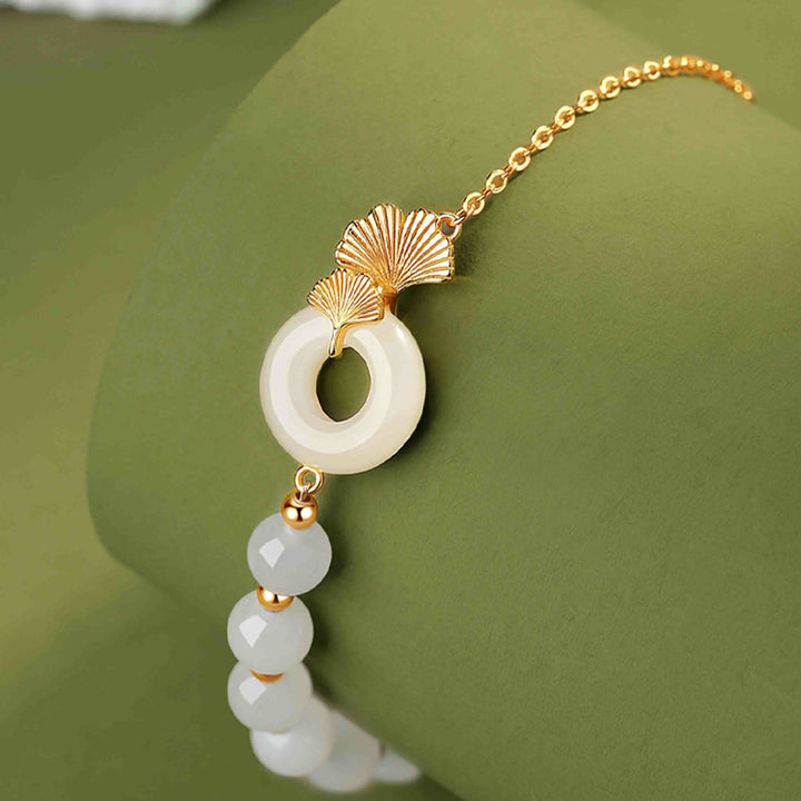 Braccialetto della fortuna con foglia di ginkgo e fibbia della pace in argento sterling 925 con Buddha Stones e giada bianca Hetian