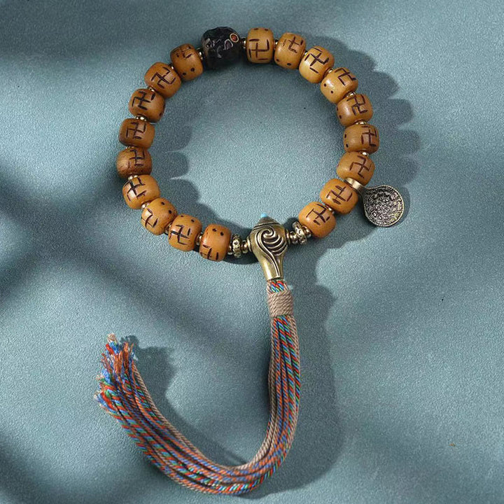 Buddha Stones naturale tibetano osso di cammello svastica Dzi perlina Shankha Buddha fascino Kirtimukha braccialetto con nappa protezione fortuna