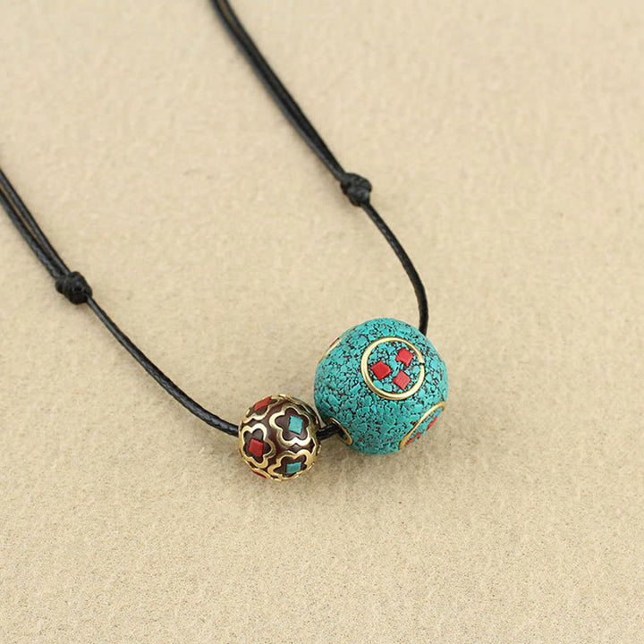 Collana con ciondolo con doppia perla turchese tibetana Buddha Stones, protezione e forza