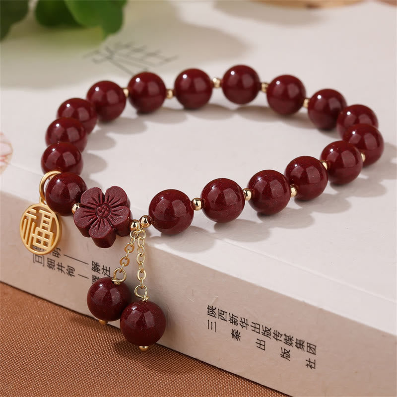 Braccialetto di benedizione con fiori di ciliegio e carattere Fu in pietra di cinabro Buddha Stones