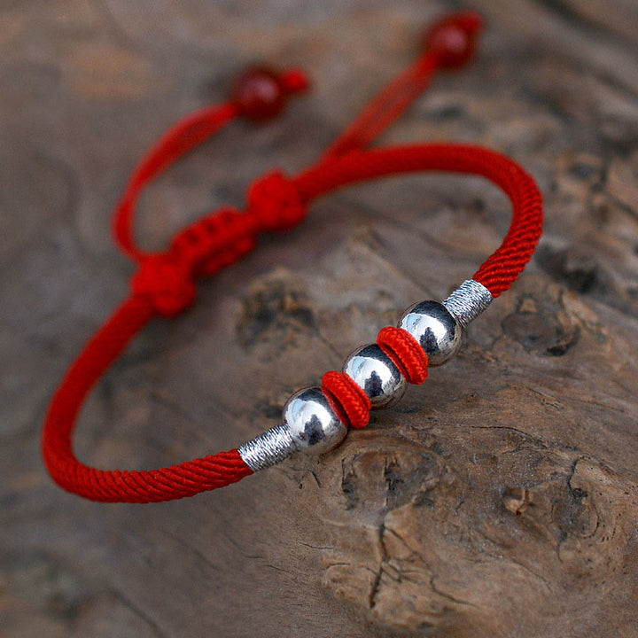 Braccialetto di corda rossa con perline portafortuna in argento sterling 925 Buddha Stones