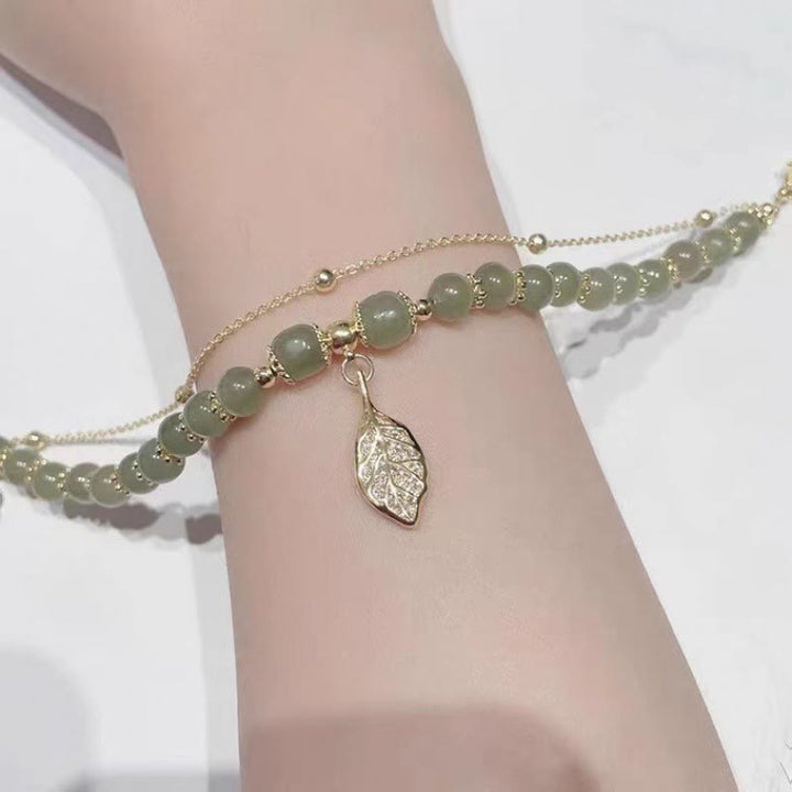 Braccialetto di perline con carattere Fu , Buddha Stones di giada, foglia di ginkgo, tulipano, arachidi e fortuna