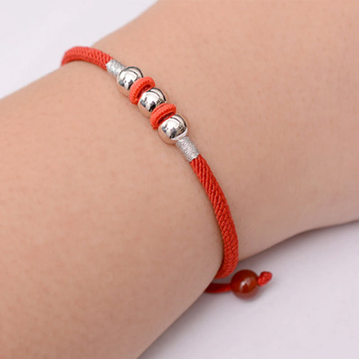 Braccialetto di corda rossa con perline portafortuna in argento sterling 925 Buddha Stones