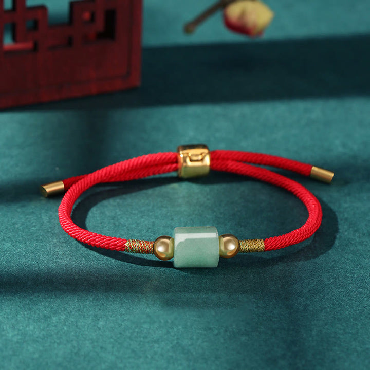 Braccialetto in corda intrecciata con protezione dalla fortuna in malachite, fatto a mano in Tibet, con Buddha Stones verde e pietra rossa