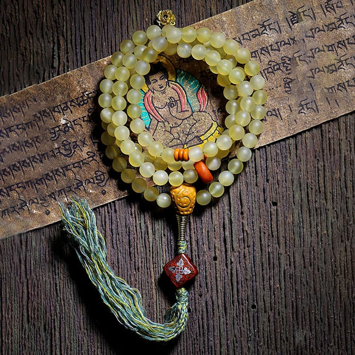 Braccialetto della fortuna in ambra e corno di pecora del Tibet con 108 perle di Mala Buddha Stones