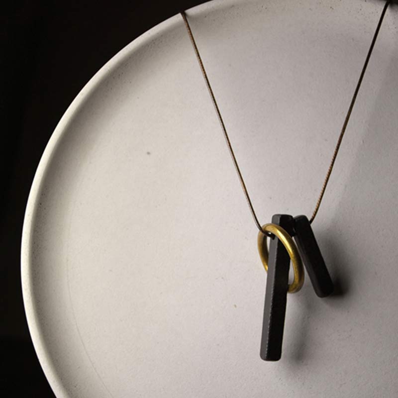 Collana con ciondolo in legno di ebano e cerchio zen Buddha Stones , illuminazione
