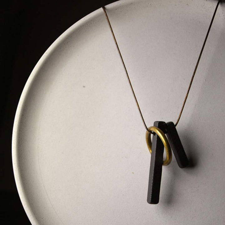Collana con ciondolo in legno di ebano e cerchio zen Buddha Stones , illuminazione