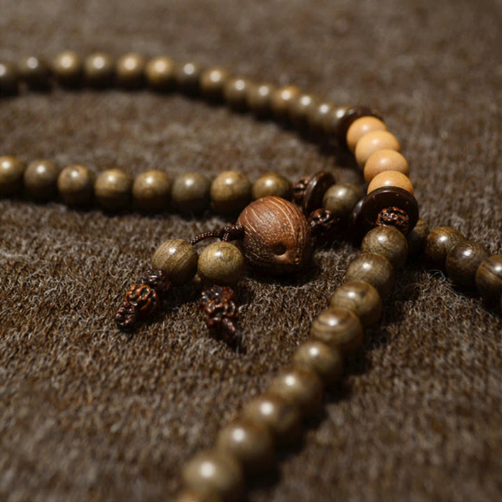 Bracciale Mala con ciondolo di protezione in legno di sandalo tibetano Buddha Stones