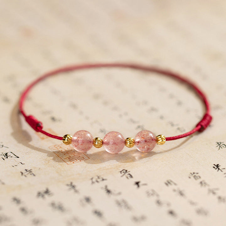 Buddha Stones Perline di cristallo di fragola Cavigliera con corda rossa portafortuna