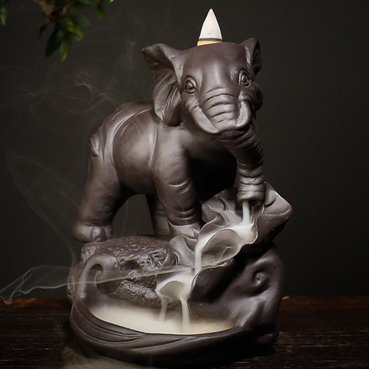 Decorazione bruciatore di incenso di guarigione della pace con fontana di fumo a riflusso in argilla viola elefante tibetano