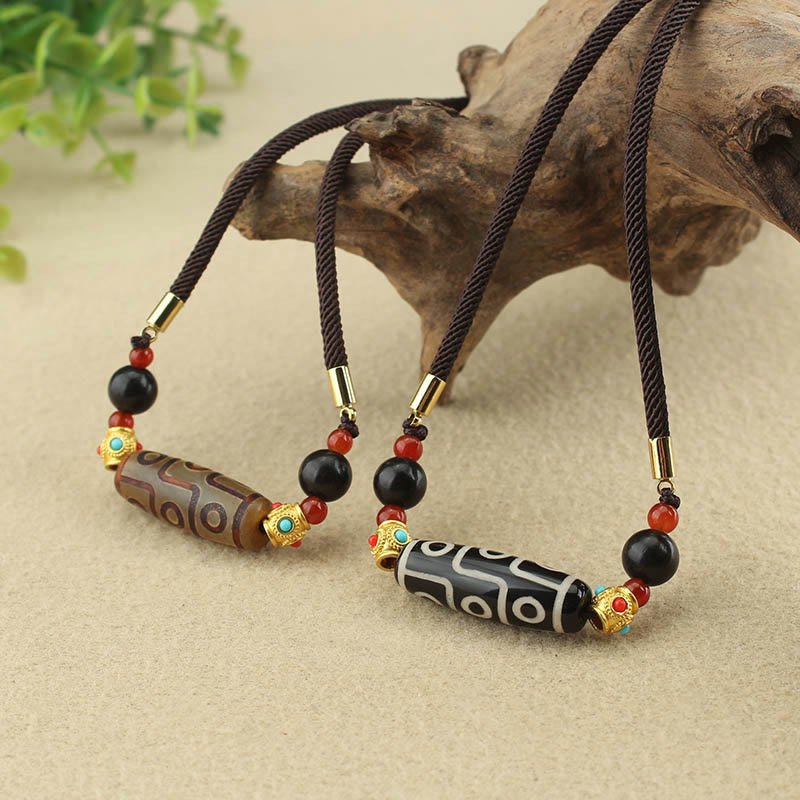 Buddha Stones Tibetano Nove Occhi Dzi Bead Protezione Benedizioni Collana Pendente