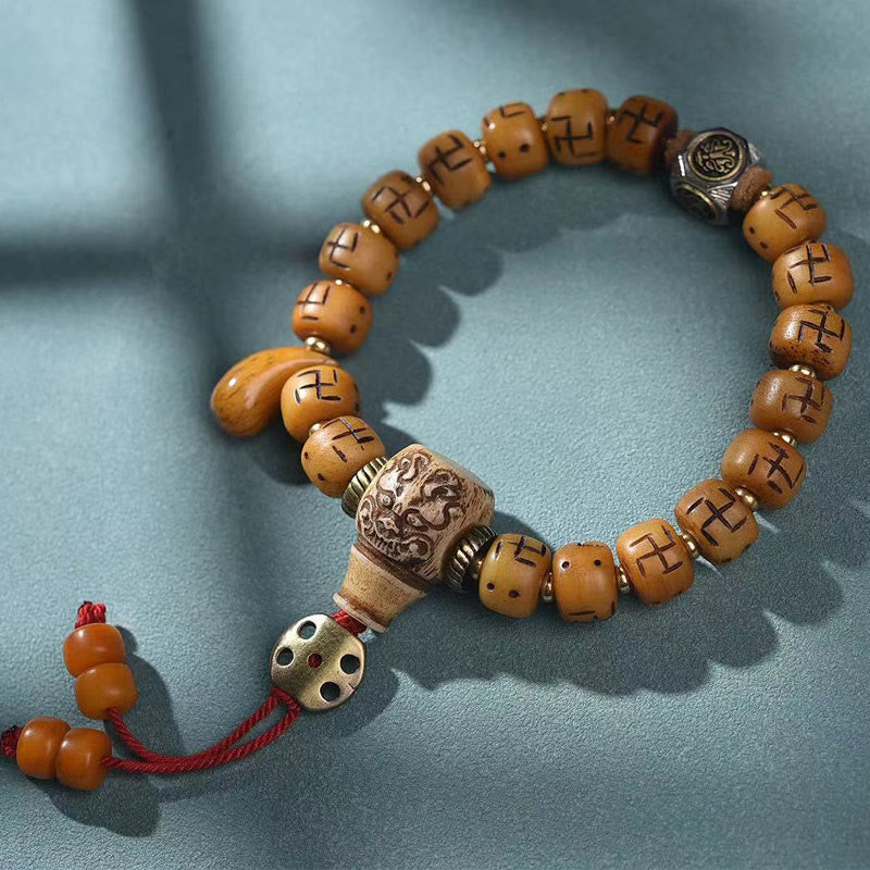Buddha Stones naturale tibetano osso di cammello svastica Dzi perlina Shankha Buddha fascino Kirtimukha braccialetto con nappa protezione fortuna