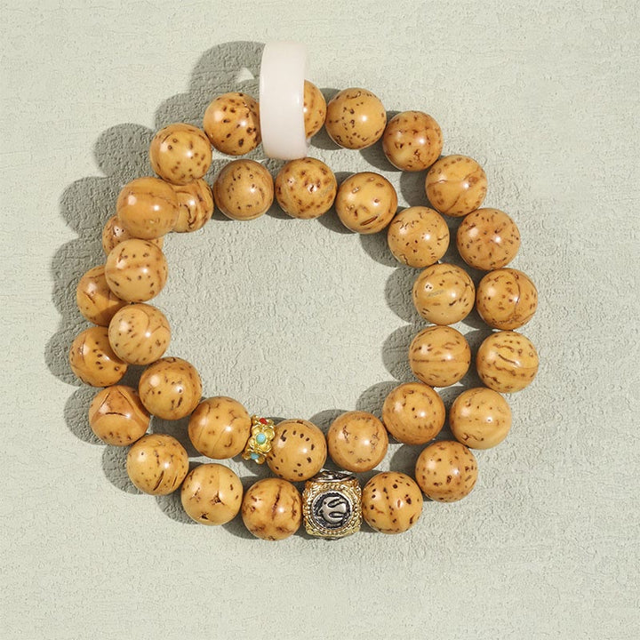 Braccialetto doppio giro Buddha Stones Tibetano Naturale Viola Oro Ratto Bodhi Seed Ricchezza
