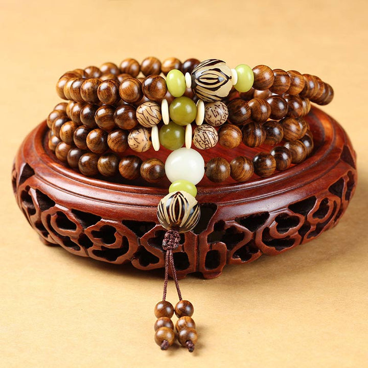 Braccialetto di protezione e calma Mala in palissandro tibetano Buddha Stones