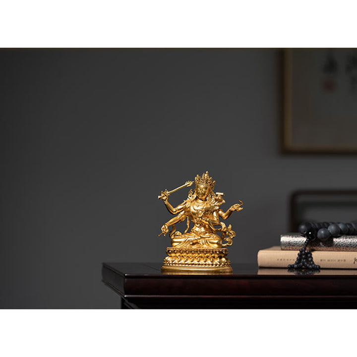 Statua in rame della compassione e serenità del Bodhisattva Manjusri a quattro braccia, statuetta in oro, decorazione per la casa