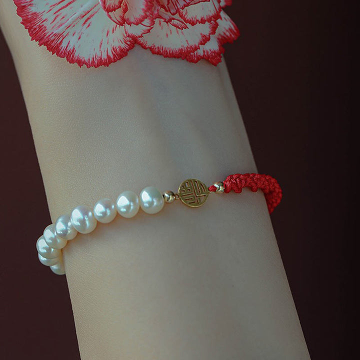 Braccialetto con treccia rossa e perle placcate in oro 14K e protezione dalla fortuna