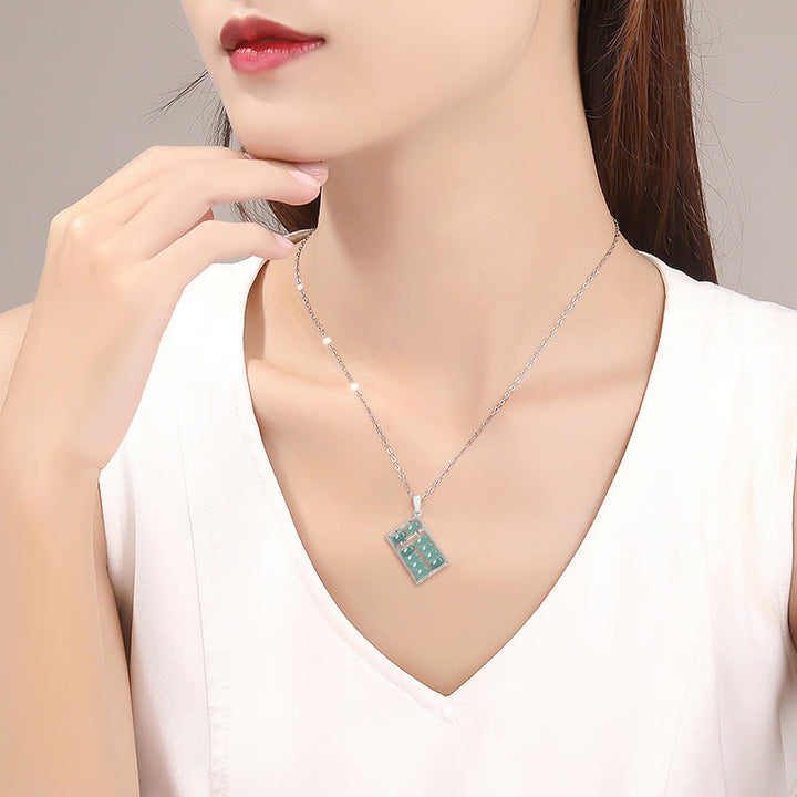 Collana con ciondolo Buddha Stones in argento sterling 925 con motivo abaco in giada naturale e motivo abbondanza