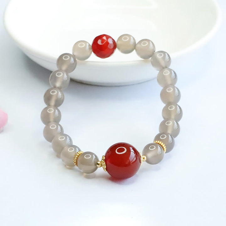 Braccialetto dell'armonia in agata rossa e calcedonio grigio naturale Buddha Stones