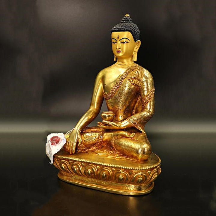 Statua di Buddha Shakyamuni Buddha della medicina Compassione in rame placcato oro Decorazione