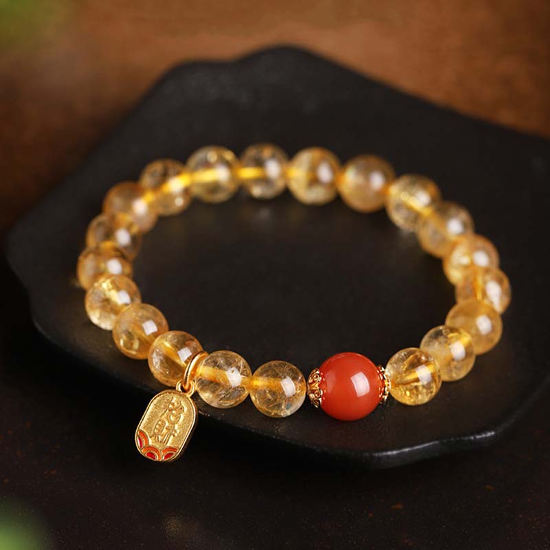 Braccialetto con ciondolo della fortuna in agata rossa e citrino Buddha Stones