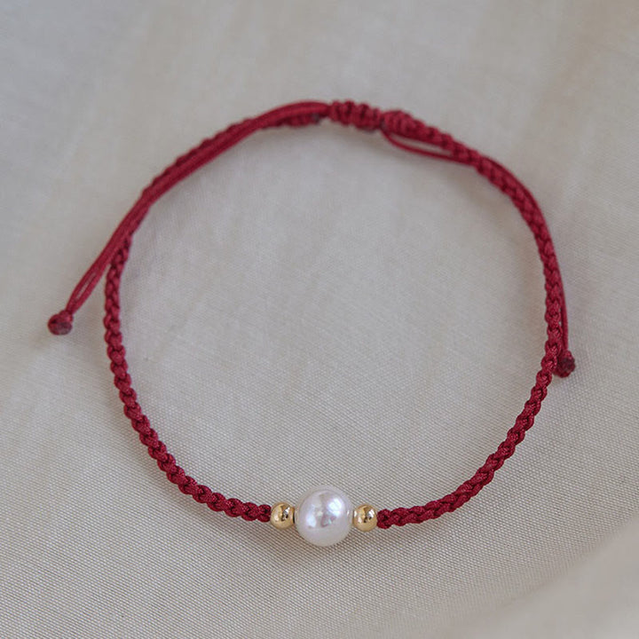 Braccialetto con treccia di perle naturali Buddha Stones Luck String